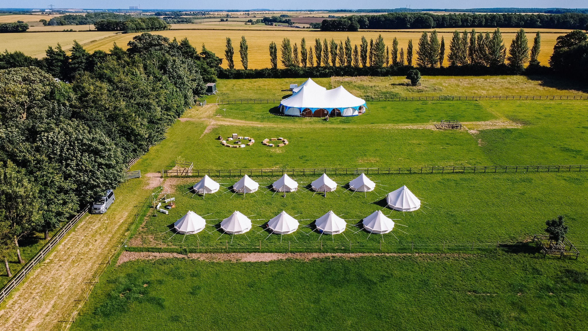 Ultimate 4 Metre Bell Tent Village in Field for Wedding