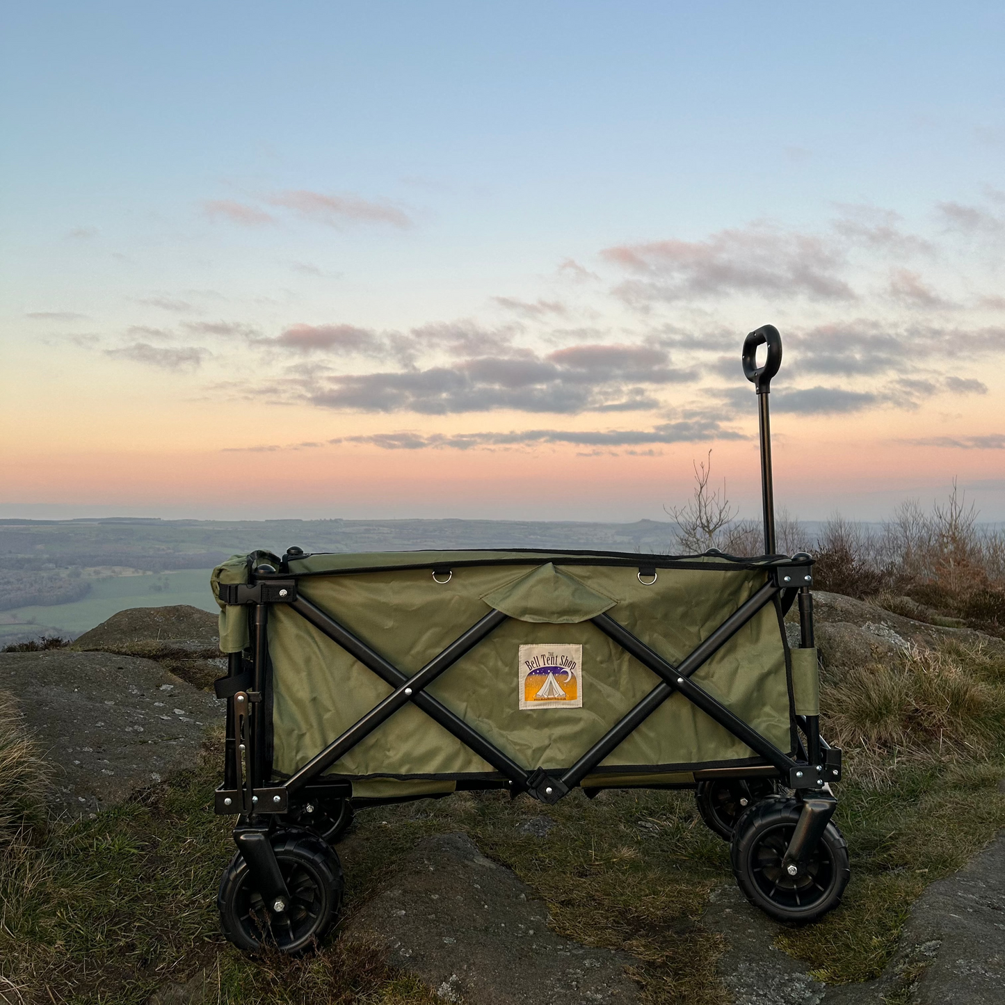 Unfolded festival trolley with The Bell Tent Shop logo